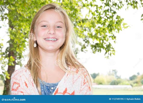 blonde girl with braces|Blonde Girl Braces Stock Photos and Images